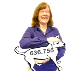 Dawn holding dog with a Dewey decimal number on it