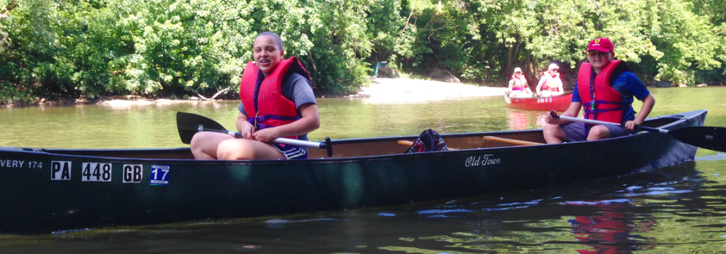 photo of family canoeing