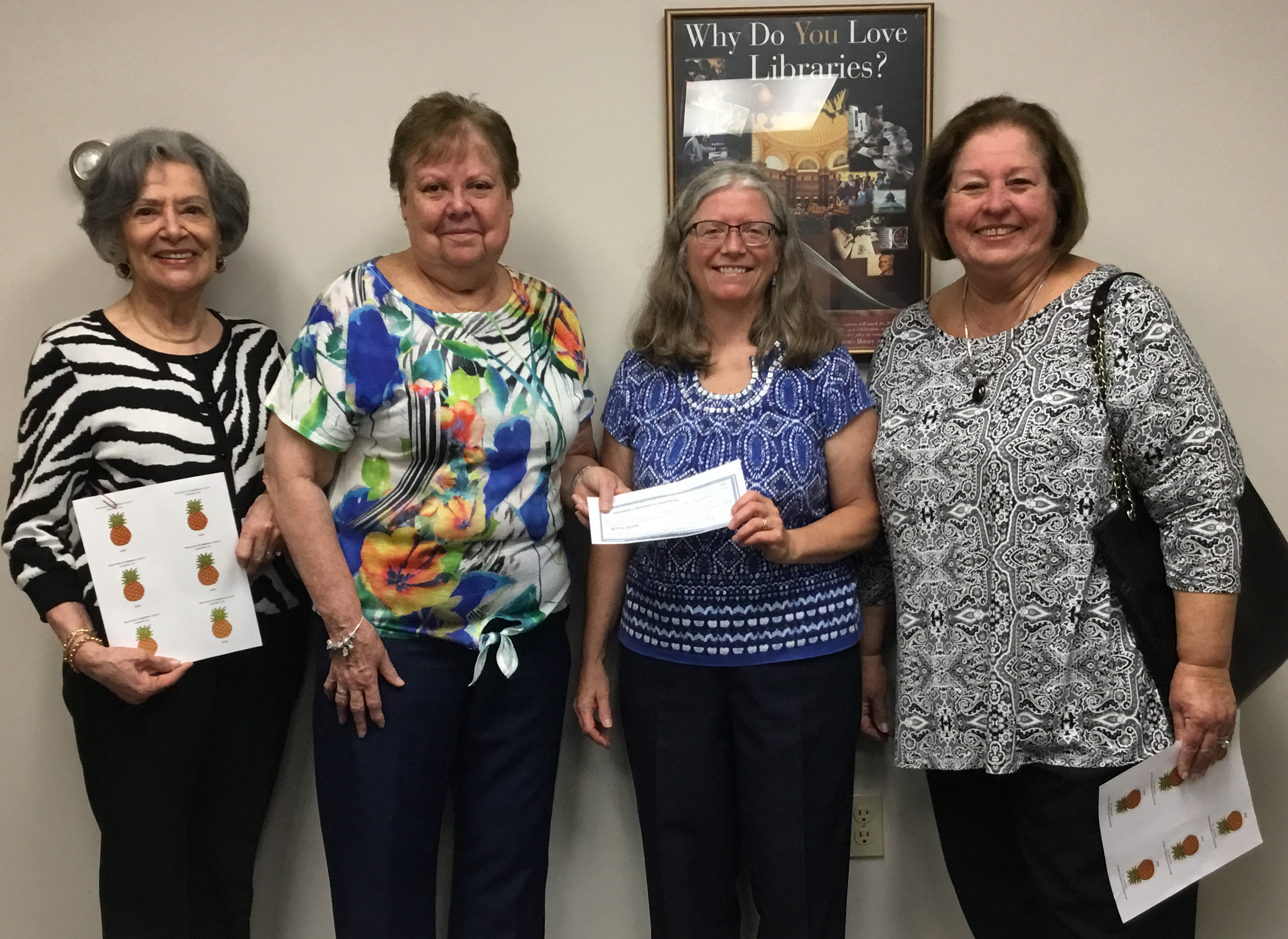 The Newcomers and Neighbors of Lancaster Club check presentation for Public Libraries of Lancaster County